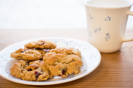 a plate of cookies and glass