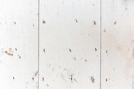 an old painted white boardの写真素材