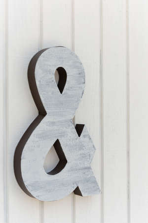 A Ampersand sign on a wallの写真素材