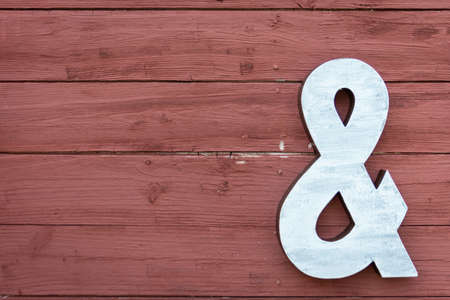 A Ampersand sign on a wallの写真素材