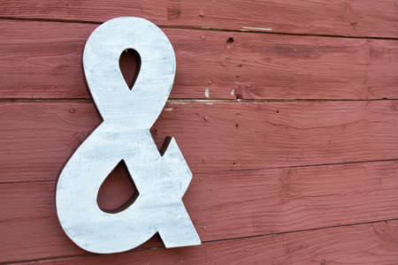 A Ampersand sign on a wallの写真素材