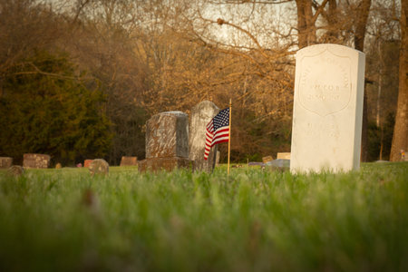 a white gravestone with a flagの写真素材