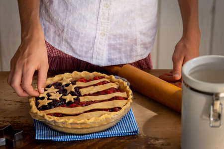 handmaking a flag fruit pieの写真素材