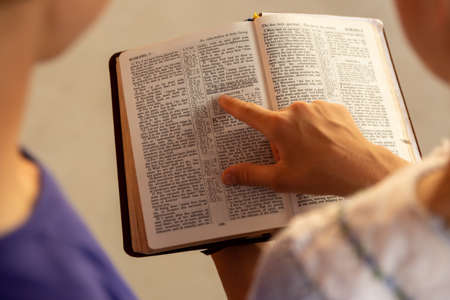 too girls sharing the gospelの写真素材