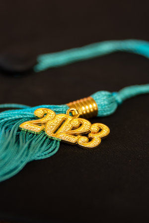 a 2023 graduation tassel on blackの写真素材