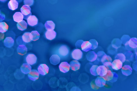 cobalt bokeh background white multi color heptagon shape / bright water drop on blue shade space