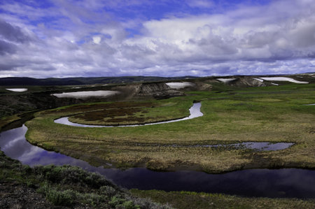 The Yellowstone River winding through the Hayden Valley in Yellowstone National Park