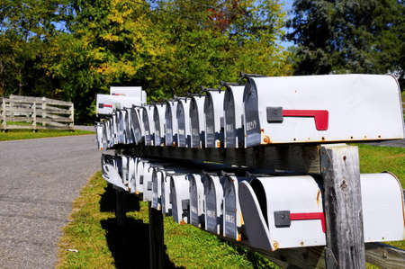 Rural Mailboxes with fall colors in the backgroundの写真素材