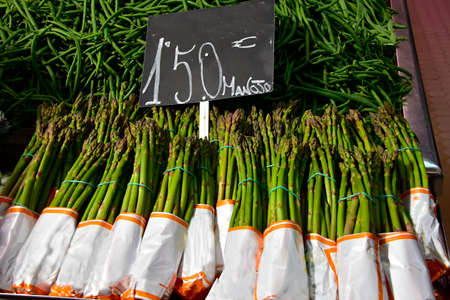 Asparagus bunches for sale at a market.の写真素材