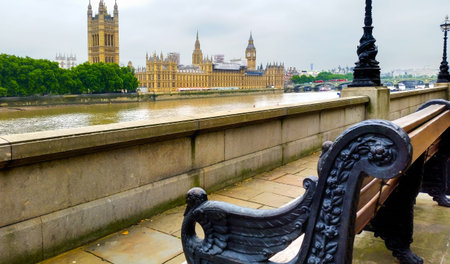 There is a nice pedestrian walk way called the Albert Embankment, along the River Thames in London, with benches.の写真素材