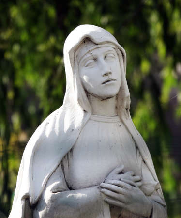 Kiev, Ukraine June 8, 2020: Virgin Mary - Mother of God monument serves as a decoration for the entrance to the churchのeditorial素材