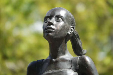 Kiev, Ukraine April 24, 2020: Sculpture the face of a girl with pigtails looking into the distanceのeditorial素材