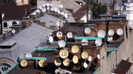 Artists painted antennas on the roofs in the form of emoticonsのeditorial素材