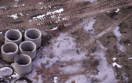 Kiev, Ukraine, October 17, 2018: Workers in the mud of a construction site at the stage of excavation; construction of a supermarket AUCHANのeditorial素材