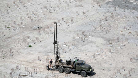 Kiev, Ukraine August 30, 2019: Work of the drilling machine at the place of construction of the houseのeditorial素材