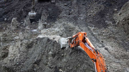 Kiev, Ukraine March 13, 2019: Tractors and excavators work on the construction of the foundation zero cycleのeditorial素材