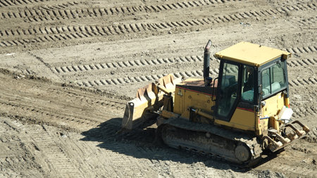 Kiev, Ukraine March 13, 2019: Tractors and excavators work on the construction of the foundation...