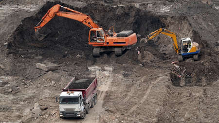 Kiev, Ukraine March 13, 2019: Tractors and excavators work on the construction of the foundation zero cycleのeditorial素材