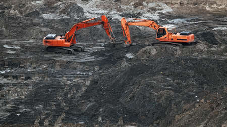Kiev, Ukraine March 13, 2019: Tractors and excavators work on the construction of the foundation zero cycleのeditorial素材