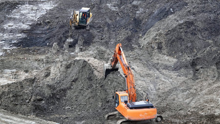 Kiev, Ukraine March 13, 2019: Tractors and excavators work on the construction of the foundation zero cycleのeditorial素材