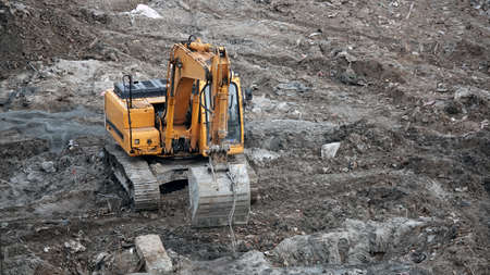 Kiev, Ukraine March 13, 2019: Tractors and excavators work on the construction of the foundation zero cycleのeditorial素材