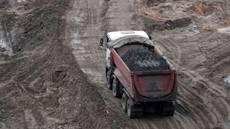 Kiev, Ukraine March 13, 2019: Tractors and excavators work on the construction of the foundation zero cycleのeditorial素材