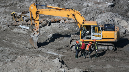 Kiev, Ukraine March 13, 2019: Tractors and excavators work on the construction of the foundation zero cycleのeditorial素材