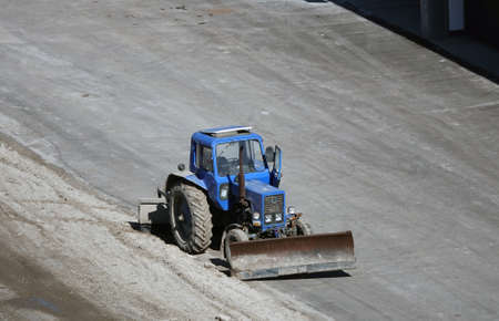 Kiev, Ukraine March 13, 2019: Tractors and excavators work on the construction of the foundation zero cycleのeditorial素材