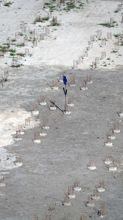 Foundation construction, concrete piles at a construction siteのeditorial素材