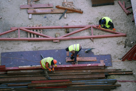Kiev, Ukraine March 13, 2019: Workers - zero-cycle construction of the foundation of an entertainment centerのeditorial素材