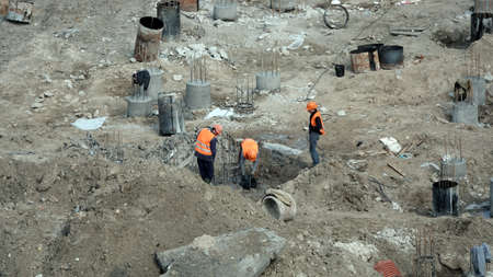 Kiev, Ukraine March 13, 2019: Workers - zero-cycle construction of the foundation of an entertainment centerのeditorial素材