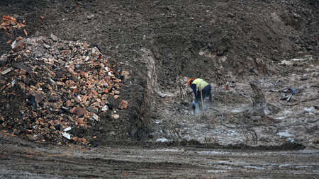 Kiev, Ukraine March 13, 2019: Workers - zero-cycle construction of the foundation of an entertainment centerのeditorial素材