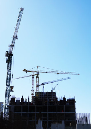 Kiev, Ukraine March 18, 2020: tower construction cranes on the construction of high-rise buildingsのeditorial素材