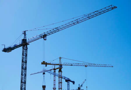 Kiev, Ukraine March 18, 2020: tower construction cranes on the construction of high-rise buildingsのeditorial素材
