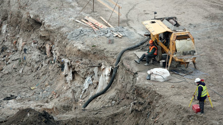 Kiev, Ukraine March 13, 2019: Workers - zero-cycle construction of the foundation of an entertainment centerのeditorial素材