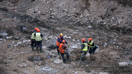 Kiev, Ukraine March 13, 2019: Workers - zero-cycle construction of the foundation of an entertainment centerのeditorial素材