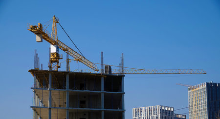 Kiev, Ukraine March 18, 2020: tower construction cranes on the construction of high-rise buildings