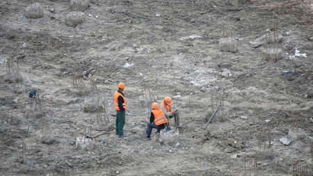 Kiev, Ukraine March 13, 2019: Workers - zero-cycle construction of the foundation of an entertainment centerのeditorial素材
