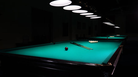pool table with balls and cue