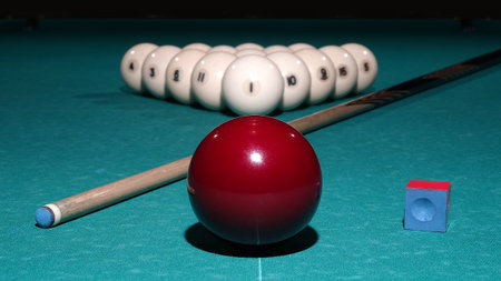 pool table with balls and cue