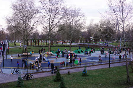 Children play outside in the playgroundのeditorial素材