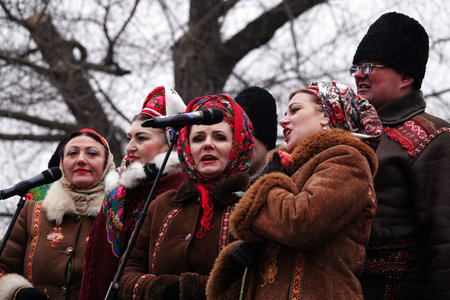 Kiev, Ukraine January 19, 2020: People in the winter on the celebration of the Water Baptism bathed in ice waterのeditorial素材