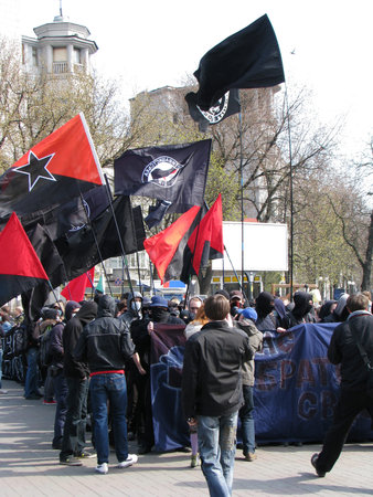 Kiev, Ukraine April 12, 2009: A march of Kiev students â€œDown with capitalismâ€ masked...