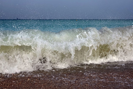 Sea big waves on the shore of the Persian Gulf