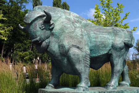 Kiev, Ukraine July 6, 2021: Sculpture of a buffalo near the entrance to the zoo in the center of Kievのeditorial素材