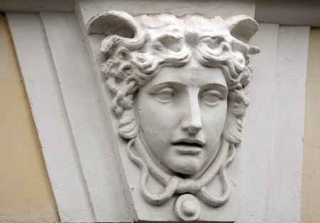 Kiev, Ukraine June 10, 2020: Artistic decoration of the facade of the building with sculptures of...
