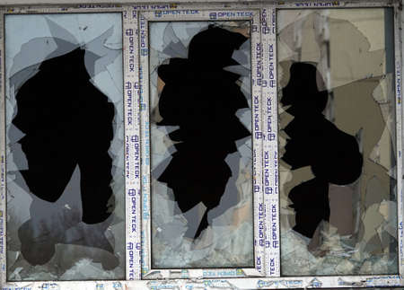 Kiev, Ukraine April 21, 2021: Broken windows in an apartment building in Kievのeditorial素材