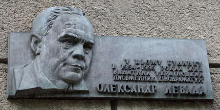 Kiev, Ukraine June 10, 2021: Bas-relief Alexander Stepanovich Levada Soviet and Ukrainian writer, poet, essayist, pamphleteer, playwright and screenwriter.のeditorial素材