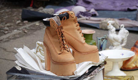Kiev, Ukraine March 11, 2021: People, rows of goods and aisles at the antique market on Petrovka in the city of Kievのeditorial素材