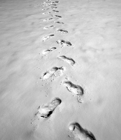 Human footprints in the snowの写真素材